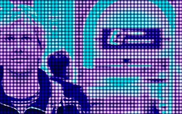 A stylised digital image with a dot matrix-like overlay, resembling a large LED screen. On the left, a person’s face is visible, with an individual behind them looking away, while the right side features abstract, curved shapes in vibrant teals and purples.