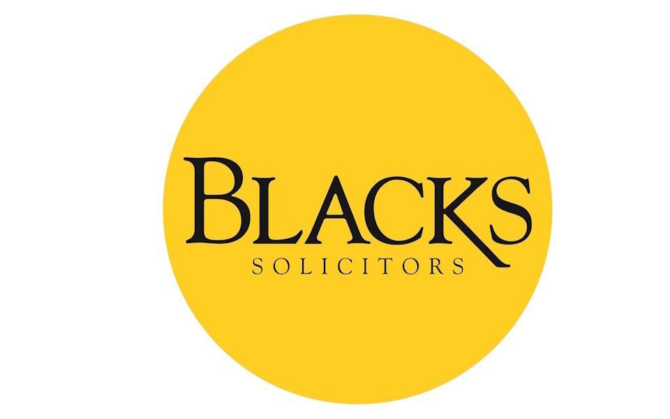 The Blacks Solicitors logo. The name of the company in a yellow circle.
