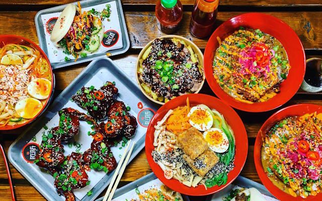 A colourful selection of Yuzu's food in bowls and trays.