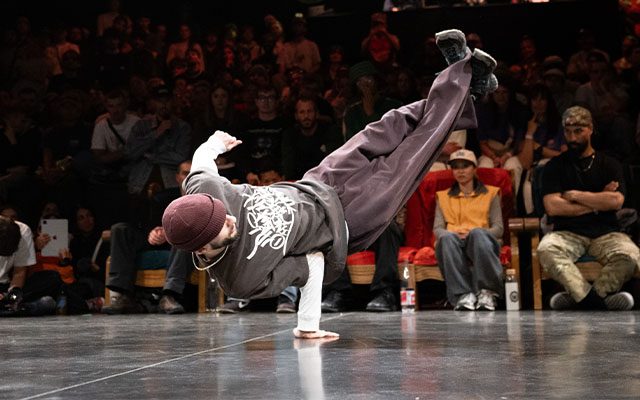 White man breakdancing